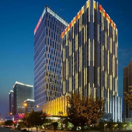 فندق Wanda Realm لونغيان المظهر الخارجي الصورة