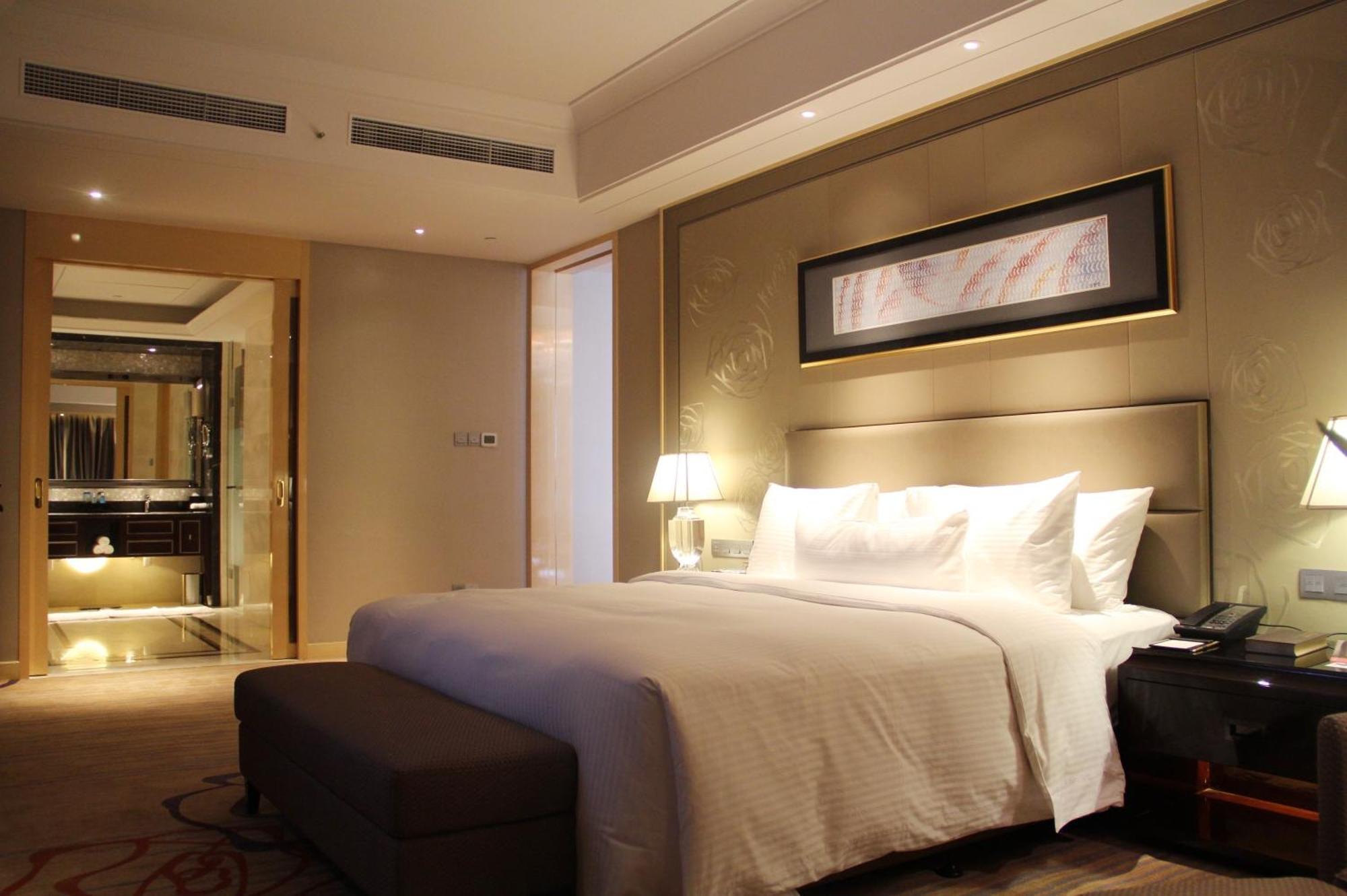 فندق Wanda Realm لونغيان الغرفة الصورة