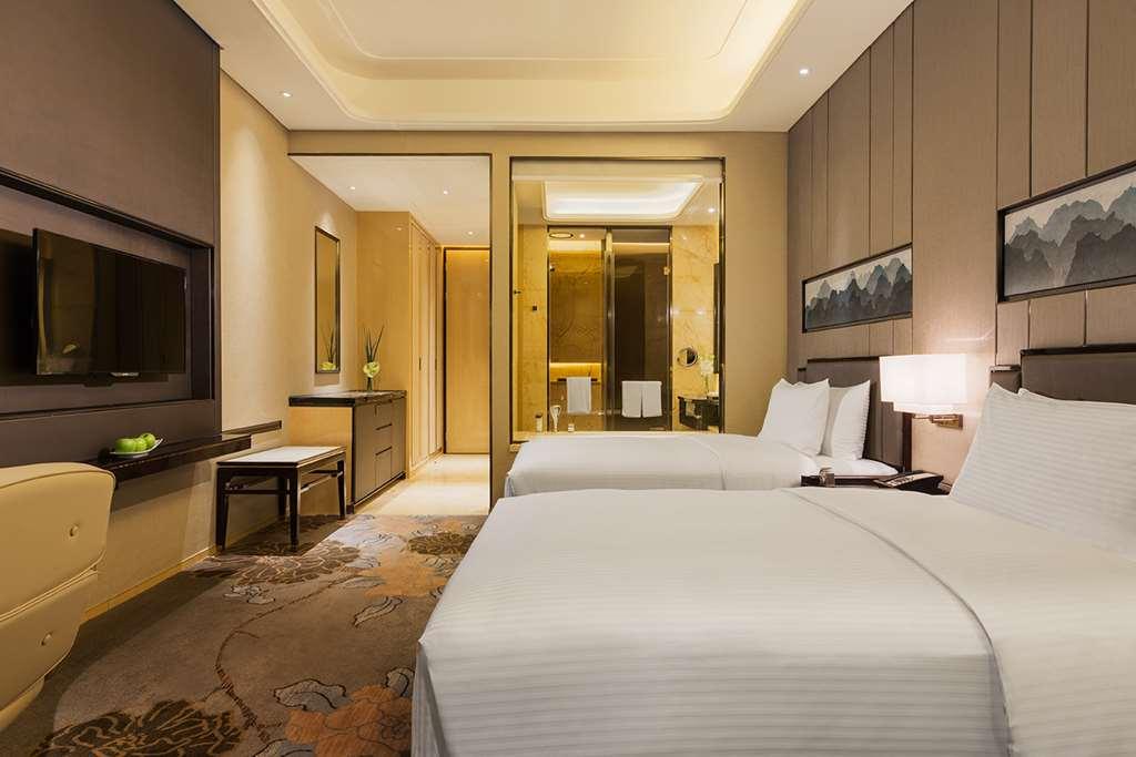 فندق Wanda Realm لونغيان الغرفة الصورة