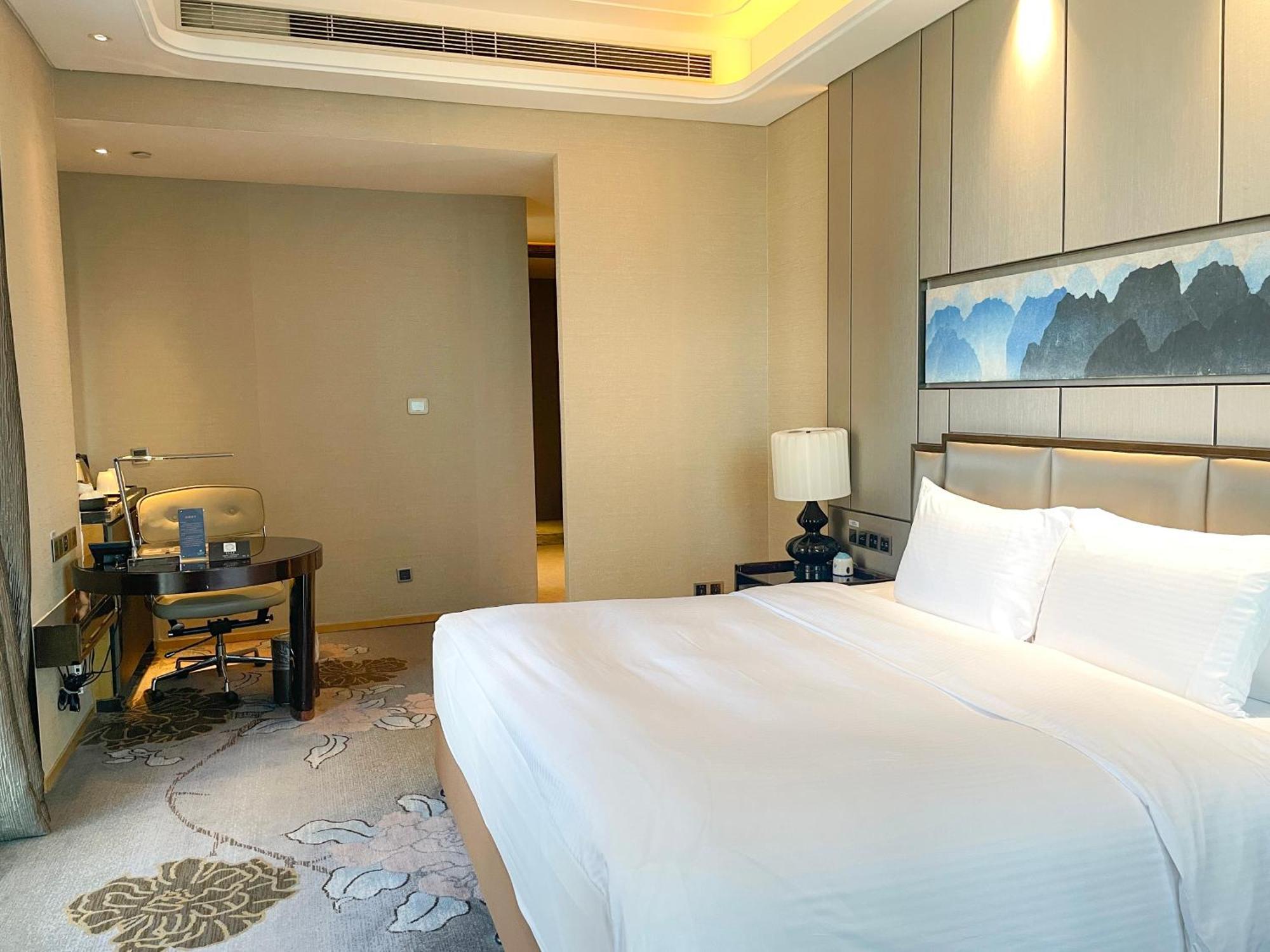 فندق Wanda Realm لونغيان المظهر الخارجي الصورة