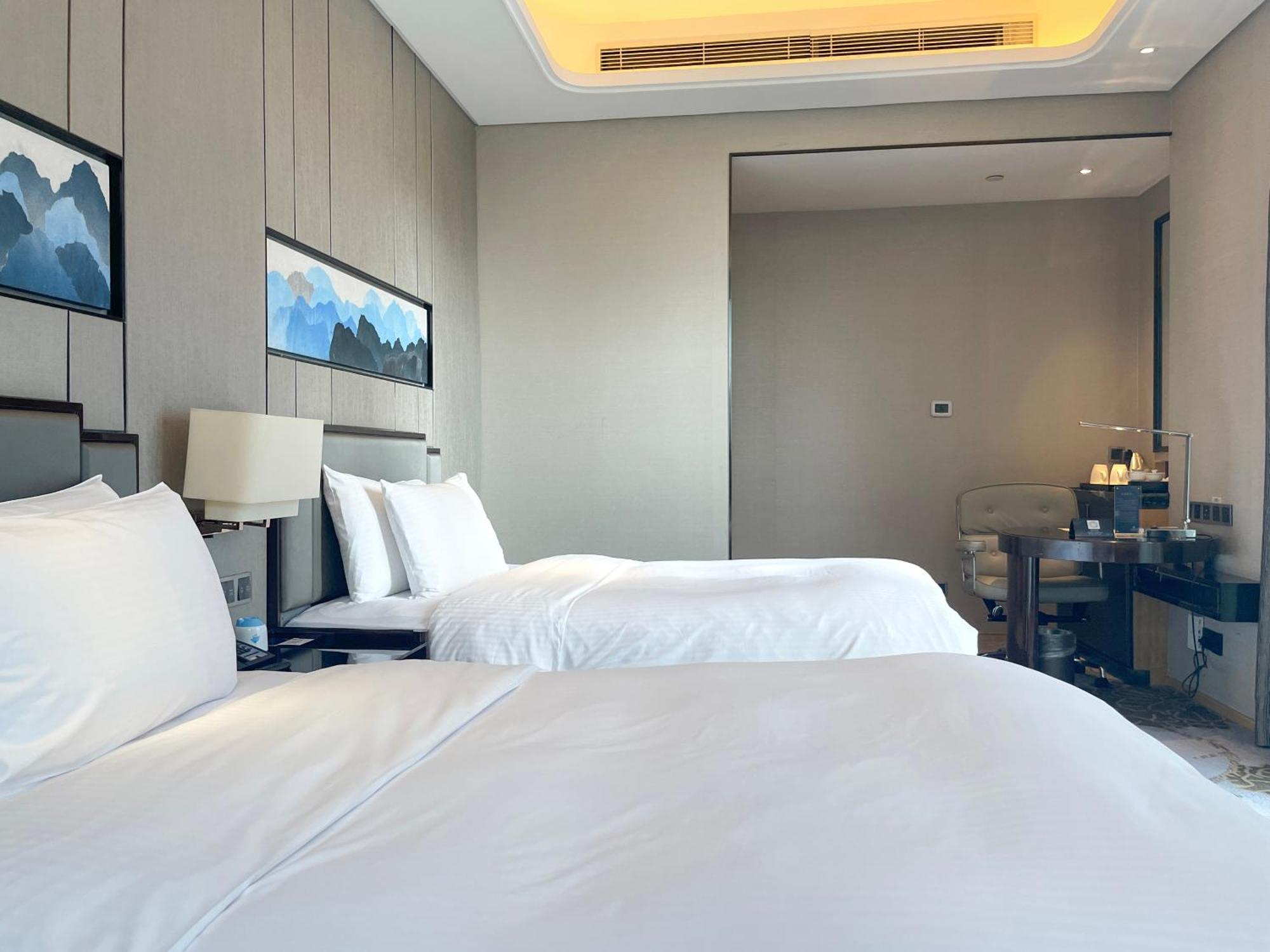 فندق Wanda Realm لونغيان المظهر الخارجي الصورة