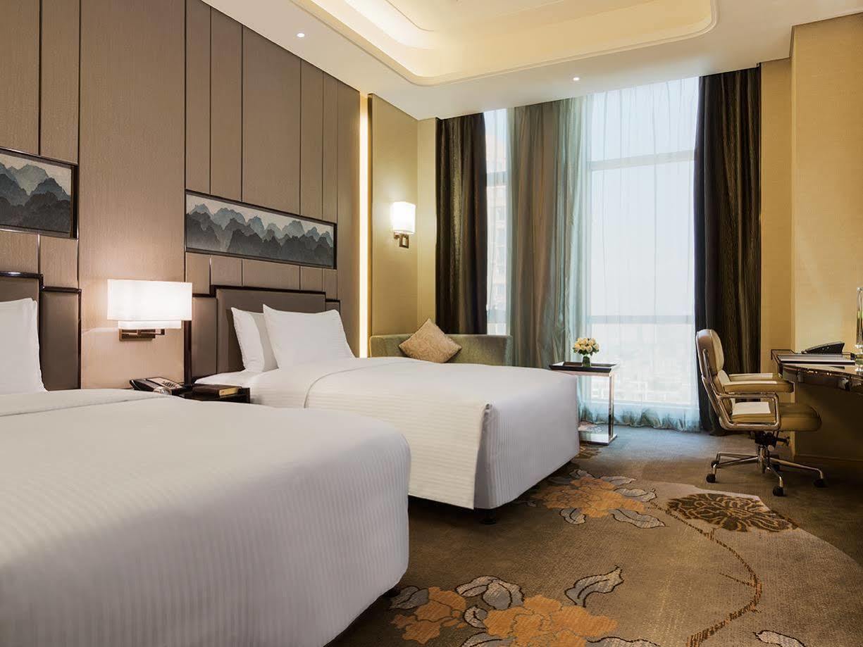 فندق Wanda Realm لونغيان المظهر الخارجي الصورة